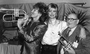Rod Stewart,  Kelly Emberg, and his dad, Robert 1984  NYC.jpg